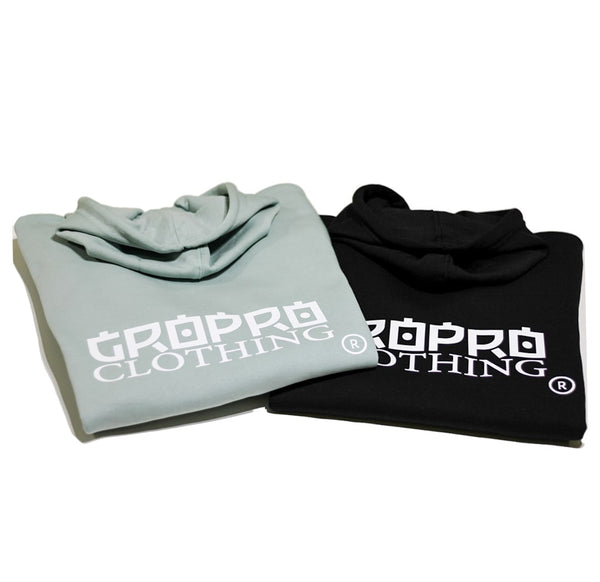 Folded Growth & Progression Clothing | GROPRO Clothing Women's Hoodie in Sage Green & Black both with White Text