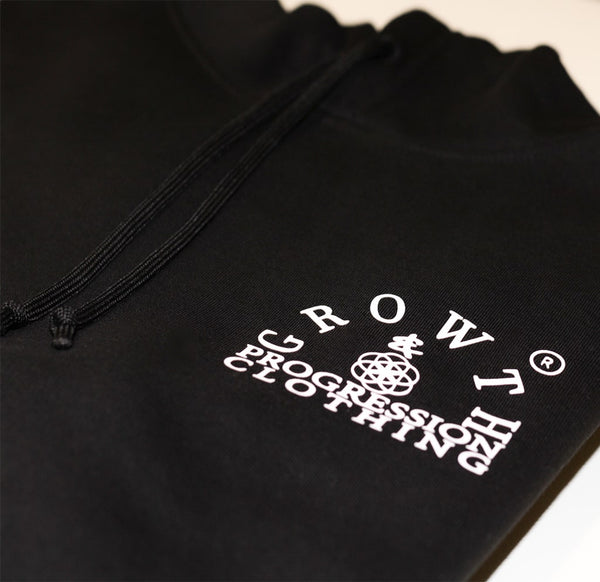 Growth & Progression Clothing Arch Logo close up view on Women's folded Black Hoodie 