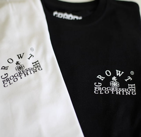 Growth & Progression Arch Logo close up on white Tee & Black Tee